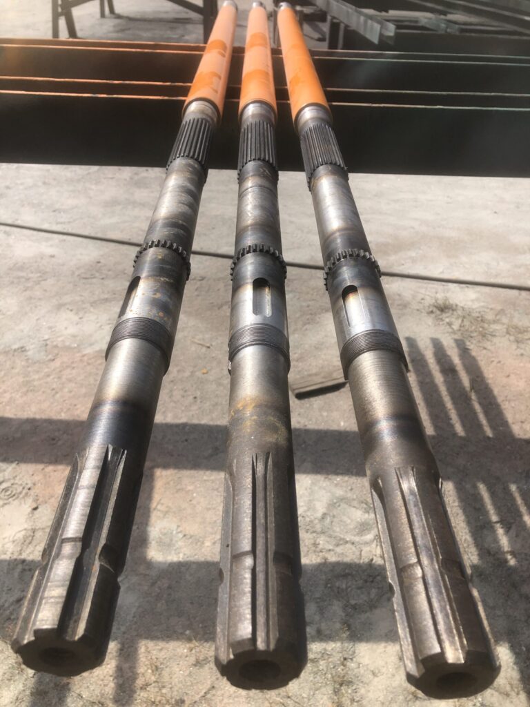 Нижній вал наклонної камери до комбайна New Holland CR 90801